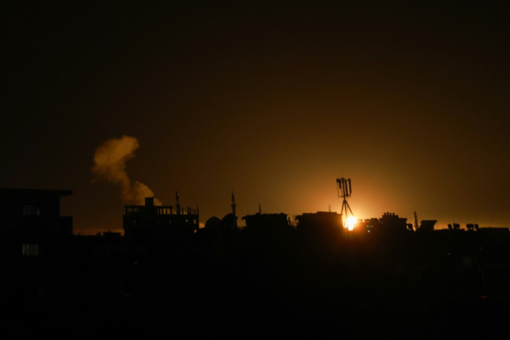 Dozens were reported killed in an overnight Israeli bombardment in the southern Gaza city of Rafah on Monday