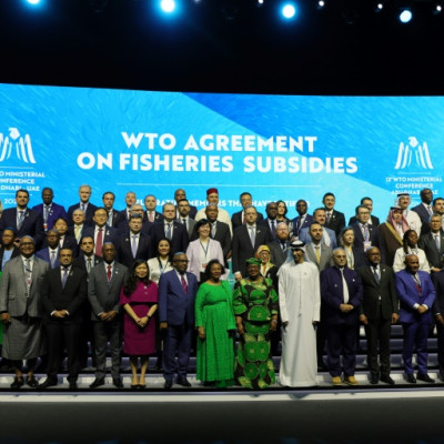 Delegates take a group picture during a session on fisheries subsidies during the 13th WTO Ministerial Conference in Abu Dhabi of February 26, 2024. The world's trade ministers gathered in the UAE on February 26 for a high-level WTO meeting with no clear 
