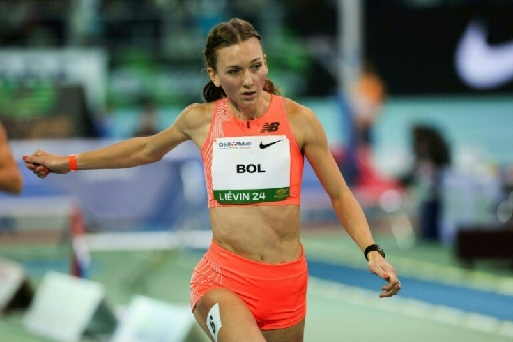 Femke Bol of the Netherlands shattered her own world record to win world indoor 400m gold in Glasgow