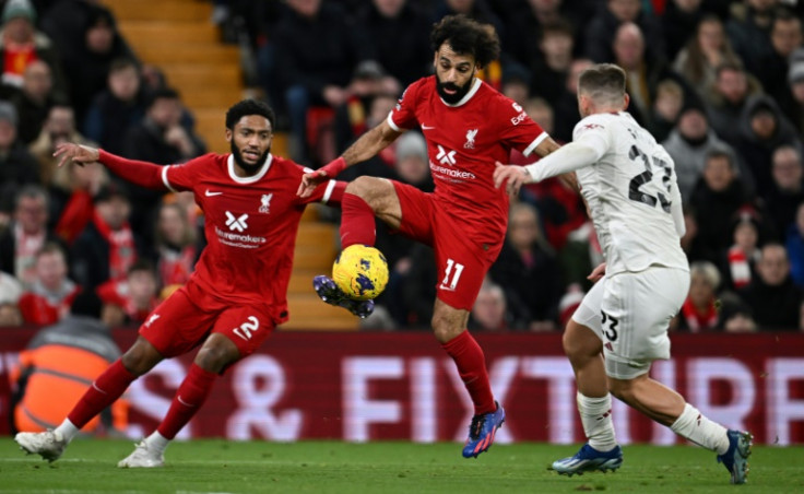 Mohamed Salah (centre) could start for Liverpool against Manchester United