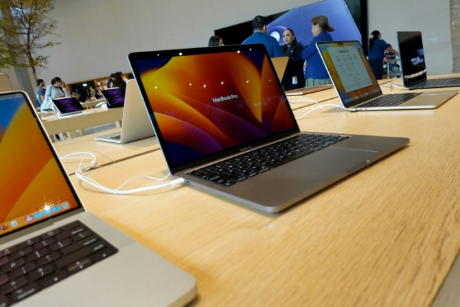 Apple computers on display at an Apple store in Miami, Florida on April 11, 2023