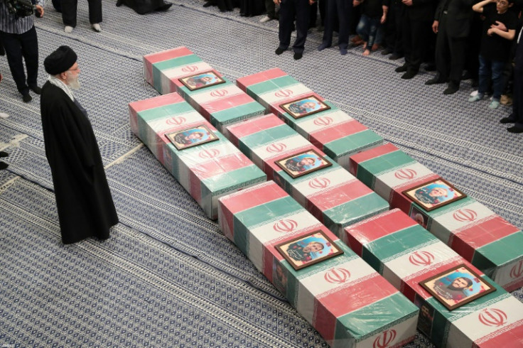 Iran's supreme leader Ayatollah Ali Khamenei leads prayers by the coffins of seven Revolutionary Guards killed in an April 1 air strike on the Iranian consulate in Damascus