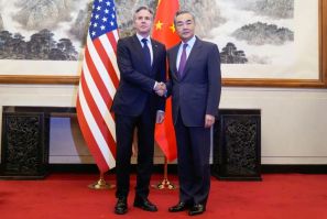 Chinese Foreign Minister Wang Yi (R) receives US Secretary of State Antony Blinken at the Diaoyutai state guesthouse