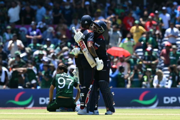 USA players Aaron Jones (right) and Nitish Kumar celebrate after a thrilling batting performance helped set up a shock win over Pakistan