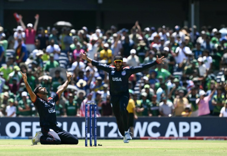 The USA's Saurabh Nethralvakar (left) celebrates after securing a shock win over Pakistan at the T20 Cricket World Cup