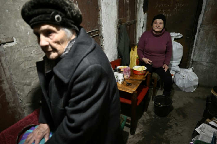 Galyna, 84, and Valentyna, 64, sheltered in the basement of a damaged residential building in Lyman
