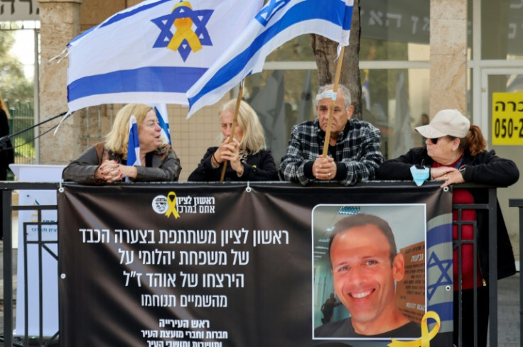Mourners wait outside the morgue in Rishon LeZion in central Israel for the funeral procession of Ohad Yahalomi (pictured), one of the Israeli hostages taken captive by Palestinian militants in the October 2023 attacks