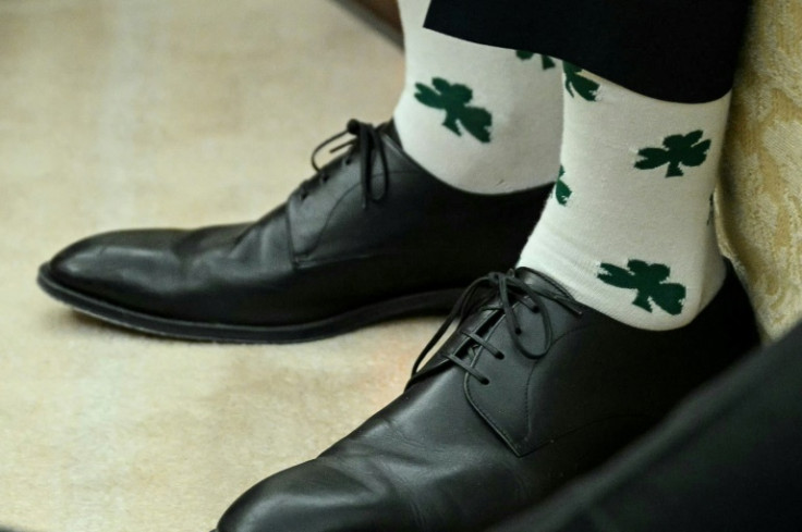 US Vice President JD Vance wears socks with shamrocks during a White House meeting with US President Donald Trump and Irish Prime Minister Micheal Martin