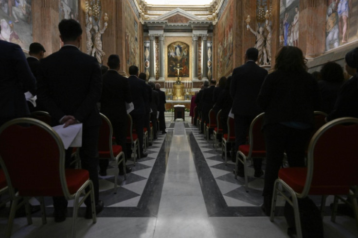 Employees assisting the cardinals in the conclave take an oath of secrecy.