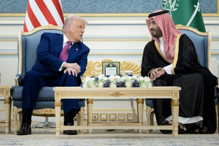 US President Donald Trump and the kingdom's Crown Prince Mohammed Bin Salman talk before a coffee ceremony at the Royal Court in Riyadh